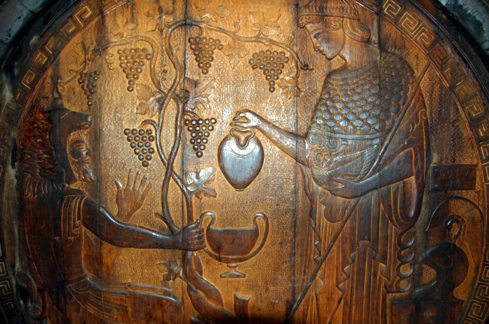 gravure sur un tonneau repr&eacute;sentant Dionysos et Athena se servant du vin